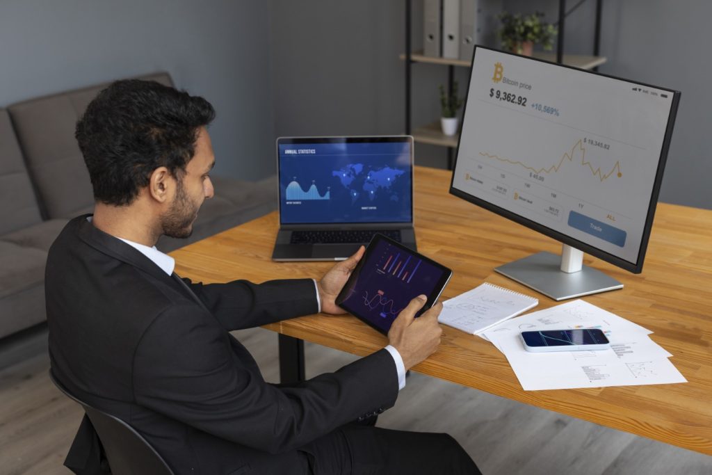 blockchain-person-looking-finance-graphs (Large)